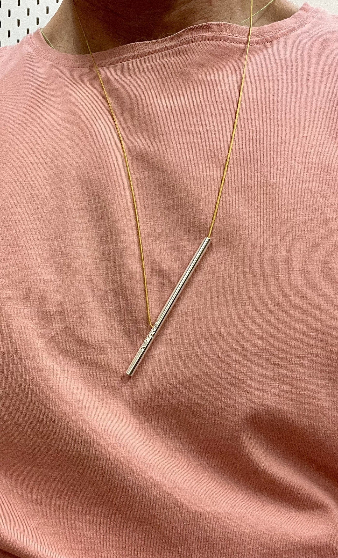 Long Carved Silver Pendant – Golden Cord