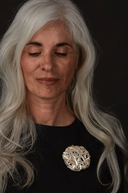 Unreel Circular Brooch